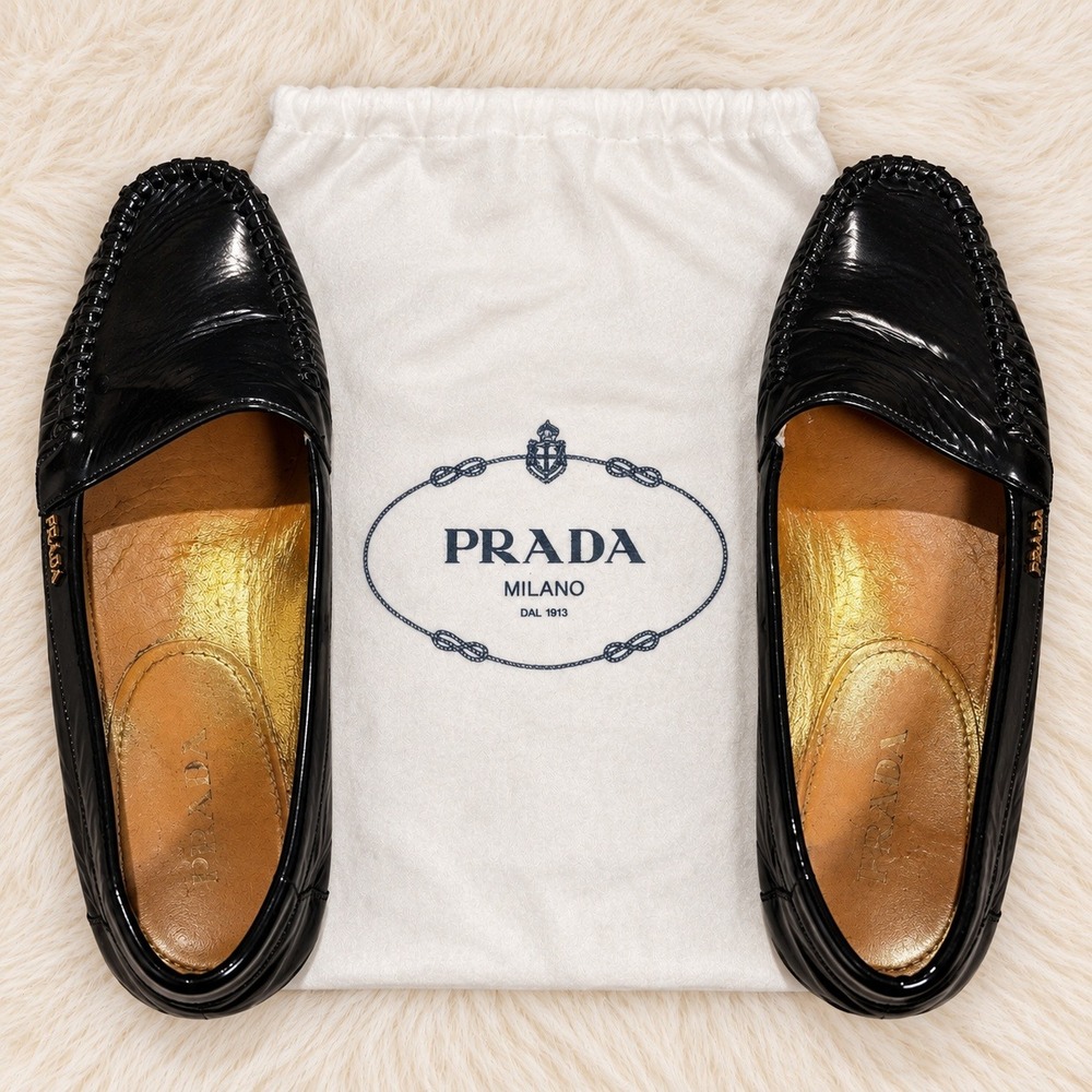 Prada Womens Black Leather Moccasin Loafers Flats Gold Logo w Dust Bag Size 36.5